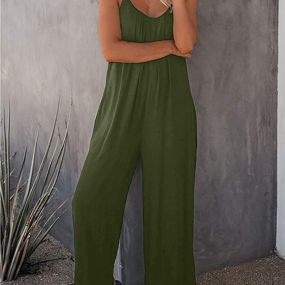 Happy sailed casual sleeveless loose jumpsuit romper with pockets. Size large.